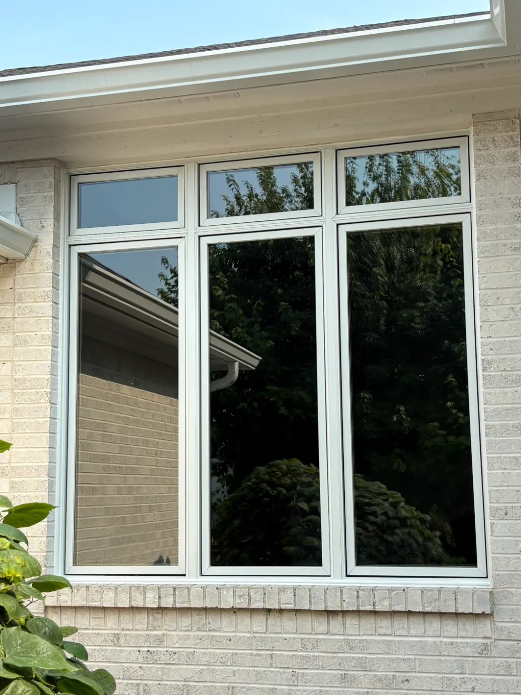 Storm-damaged window documented in Tipton